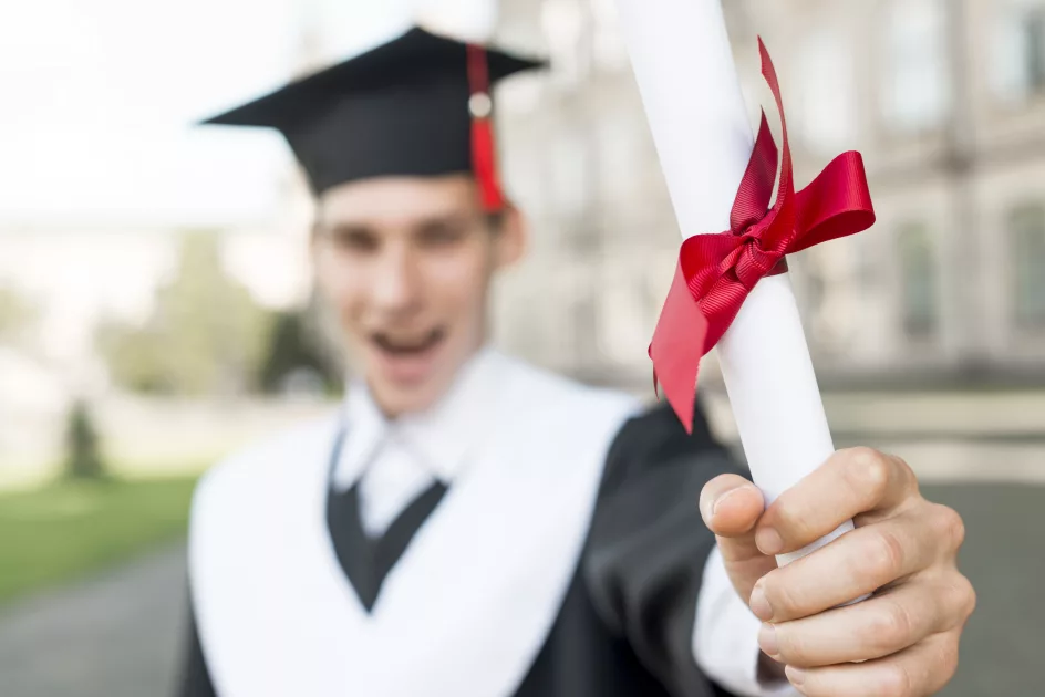 graduation concept with portrait happy man